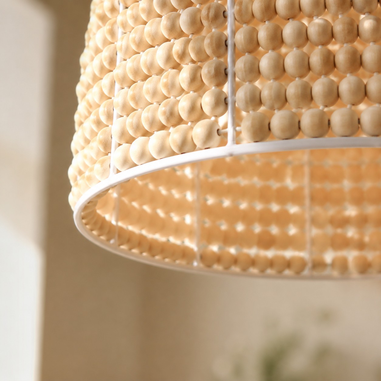 Wood bead dome shade rim and frame detail